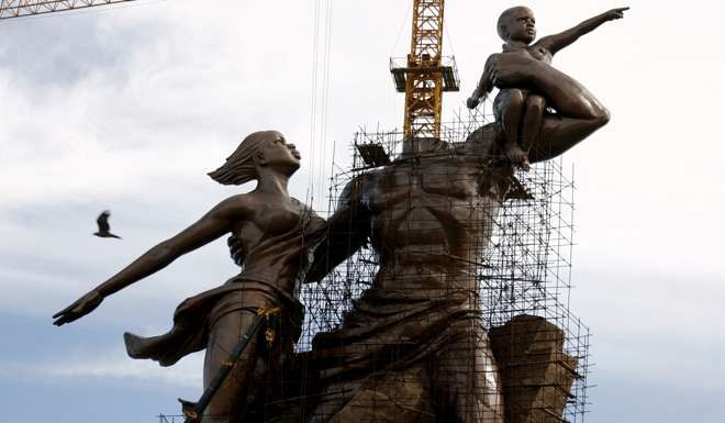A nearly finished monument to the African Renaissance rises above the Dakar skyline in Senegal's capital in 2009. The North Korean built monument was billed as a symbol of Africa's rise from ‘centuries of ignorance, intolerance and racism’. File photo: Reuters