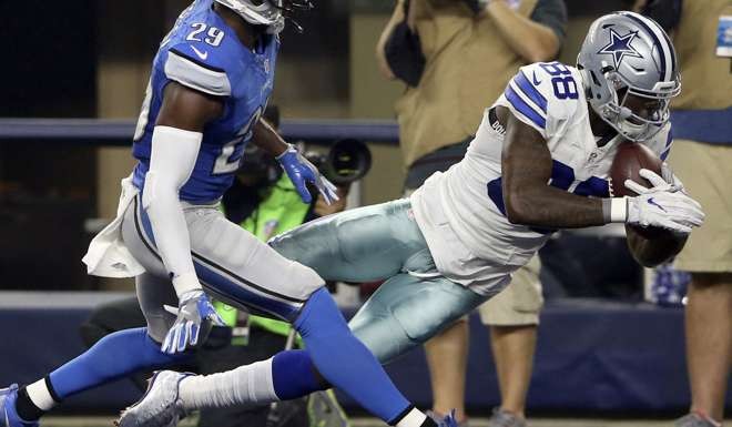 Dallas wide receiver Dez Bryant catches a touchdown pass against the Detroit Lions. Photo: USA Today Sports