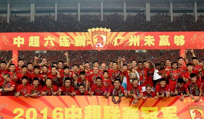 Guangzhou Evergrande celebrate their sixth straight Chinese Super League title. Photo: Xinhua