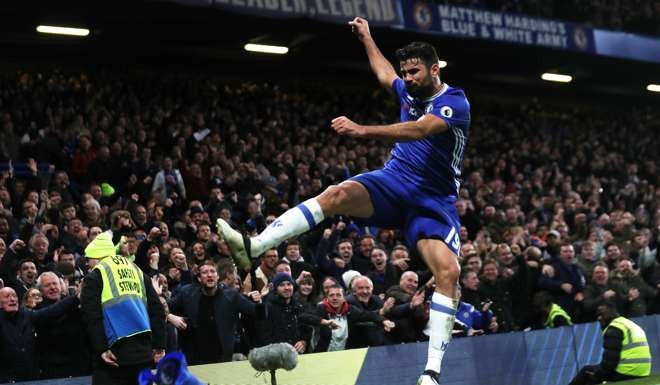 Diego Costa celebrates his goal. Photo: Reuters