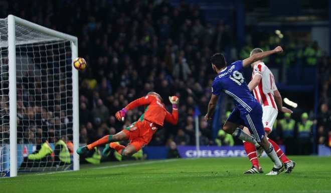 Diego Costa scores Chelsea’s fourth goal. Photo: Reuters