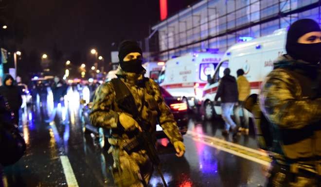 Turkish special force police officers and ambulances are seen at the site of an armed attack in Istanbul. Photo: AFP