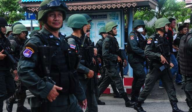 Thai soldiers patrol around Narathiwat city as part of increased security measures during the holiday season. Photo: AFP