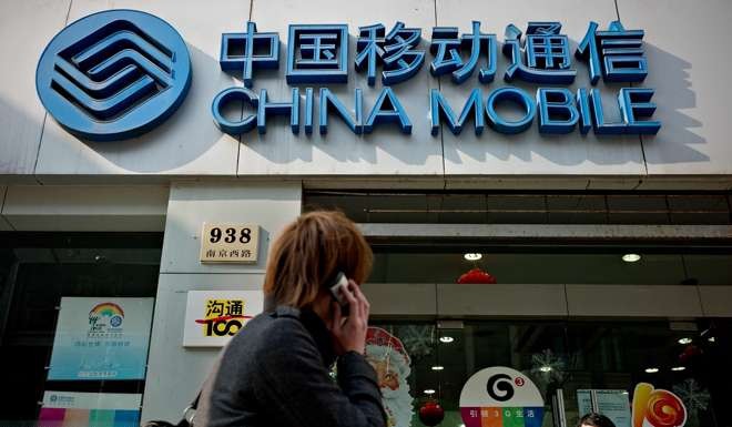 China’s major telecoms operators will likely be under pressure to roll out 5G networks early and in a large scale. Photo: AFP
