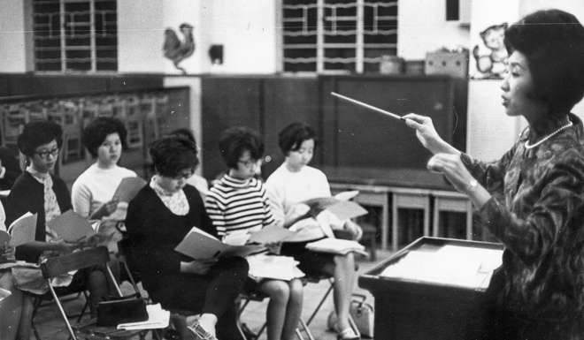Barbara Fei conducting a church rehearsal in Kowloon, in the 60s. Photo: Benson Lo
