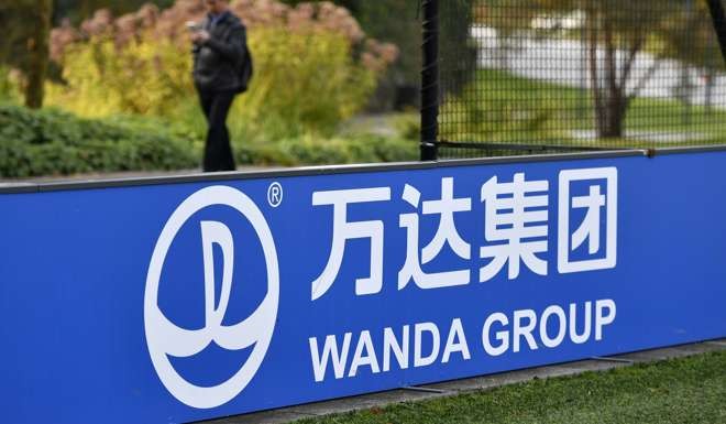 The sign and logo of Wanda Group at the world football's governing body headquarters in Zurich. Photo: AFP