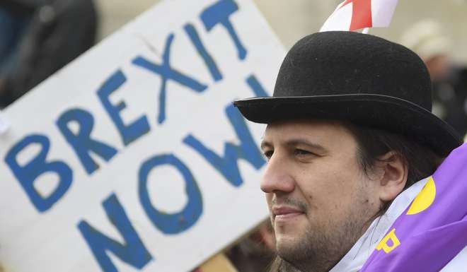 Demonstrators supporting Brexit protest outside of the Houses of Parliament in London. Photo; Reuters