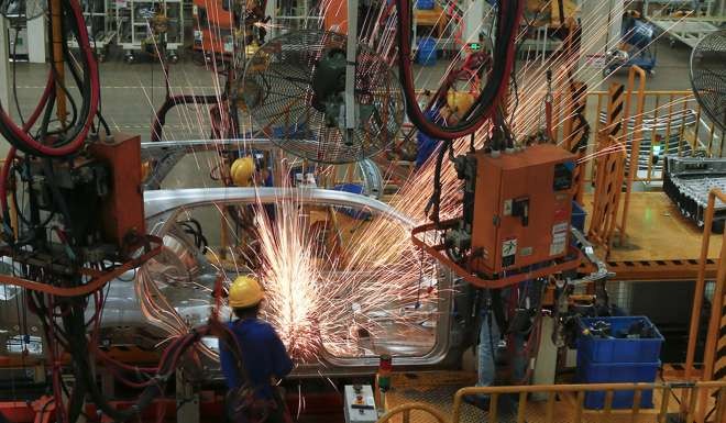 A car production line in Shenzhen. Manufacturing here, and in other Chinese cities, must become more automated, according to Casati. Photo: Reuters