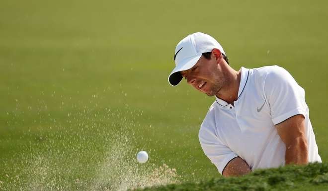 Rory McIlroy hits out of a bunker during the Cadillac Championship at Trump National Doral. Photo: AFP