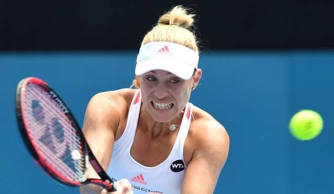 Angelique Kerber of Germany returns a shot to Daria Kasatkina of Russia. Photo: EPA