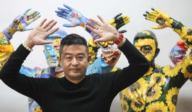 Artist Liu Bolin in his Beijing studio last week. Photo: Simon Song