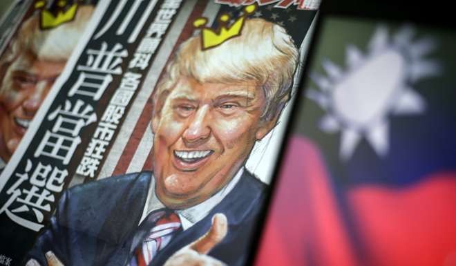 A newspaper headline with an illustration of US president-elect Donald Trump pictured next to the flag of Taiwan on December 12, 2016. Photo: EPA