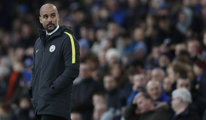 Manchester City manager Pep Guardiola can’t believe the scoreline in their 4-0 defeat by Everton. Photo: Reuters