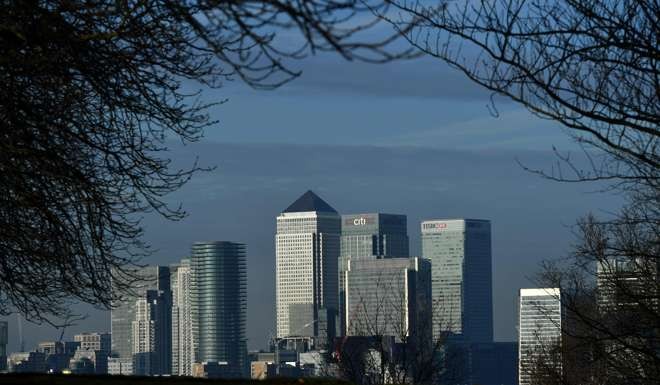 The financial offices of banks, including JPMorgan Chase, Citi, HSBC, and other institutions in the financial district of Canary Wharf, are seen from Greenwich Park in London. Banks may have to move once Britain exits the EU. Photo: AFP