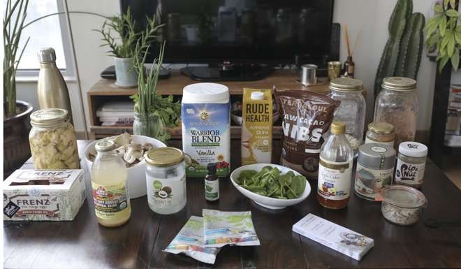 Herbs and ingredients for Rigden’s morning smoothie make up some of the items on her shelves.