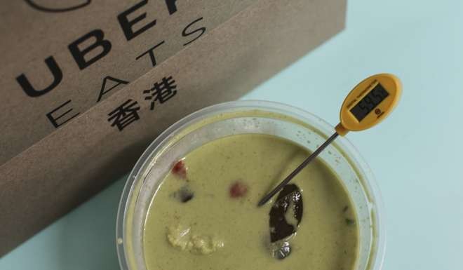 The green curry from Champion Thai Restaurant ordered through UberEats. The thermometer reading is 59.5 degrees Celsius. Photo: May Tse