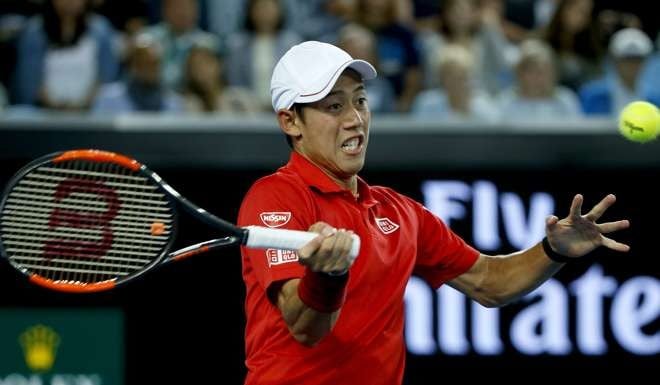 Kei Nishikori of Japan in action against Lukas Lacko of Slovakia at the Australian Open. Photo: EPA