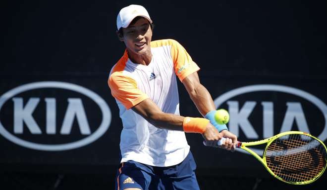 Lu Yen-hsun of Taiwan in action against Andrey Rublev of Russia at the Australian Open. Photo: EPA