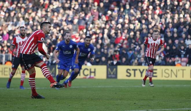 Southampton's Dusan Tadic scores from the penalty spot against Leicester. Photo: Reuters