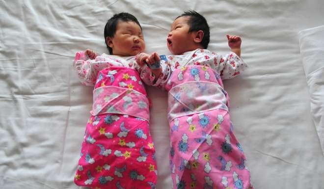 Many Chinese couples are reluctant to have a second child. Photo: AFP