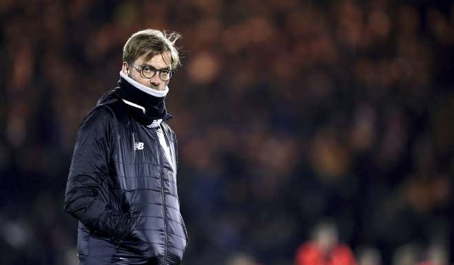 Juergen Klopp will hope Liverpool arrive in Hong Kong as champions. Photo: AP