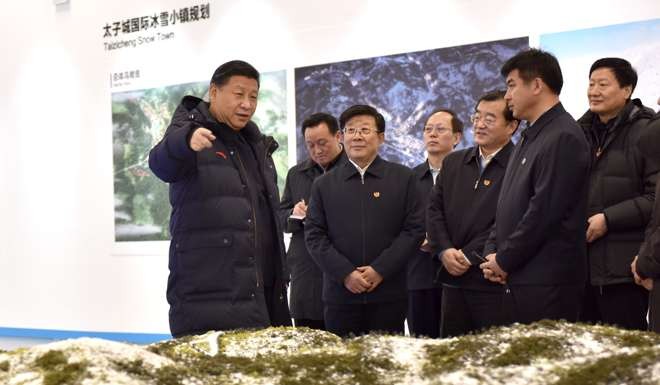 Xi Jinping (left) pictured earlier this month at an exhibition hall as part of preparations for the of Beijing 2022 Winter Olympic Games. Photo: Xinhua