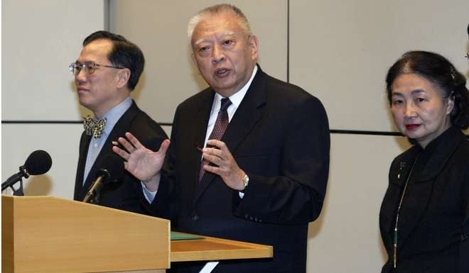 Then Hong Kong chief executive Tung Chee-hwa is flanked by his chief secretary and later successor Donald Tsang and justice secretary Elsie Leung – both members of the constitutional reform task force – as he speaks to the media about the National People’s Congress Standing Committee’s interpretations of the Basic Law, at the central government offices in April 2004. Photo: Dickson Lee