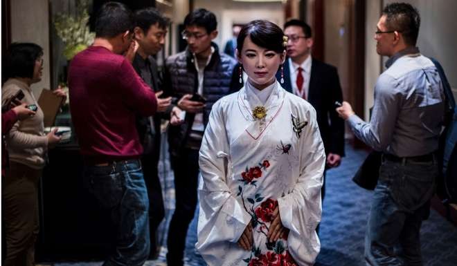 Humanoid robot Jia Jia, seen here after a presentation at a conference in Shanghai last month, was created by a team of engineers from the University of Science and Technology of China. With as many college-educated citizens as the US by 2020, several globally competitive universities, and generous funding for attracting notable scientists for visits, China stands to gain if American universities decline. Photo: AFP