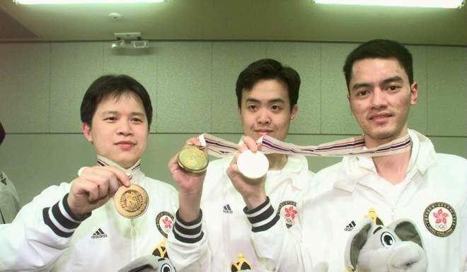 Chan Wai-tak, a young Marco Fu and Chan Kwok-ming celebrate Asian Games team gold back in 1998. Photo: SCMP