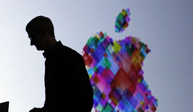As artificial intelligence and digital assistants are gathering steam, Apple and Tim Cook must learn some new tricks before it’s too late. Photo: AFP