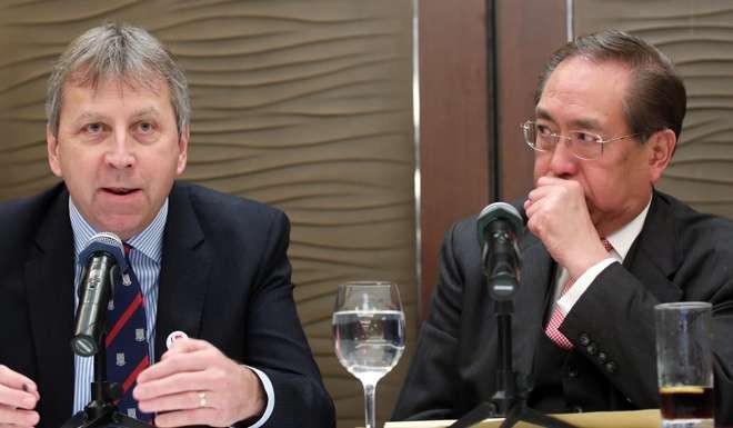 Peter Mathieson (left) with HKU governing council chairman Arthur Li. Photo: Edward Wong