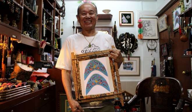 Beaded slippers at Little Shophouse, Arab Street. Photo: Jamie Carter.